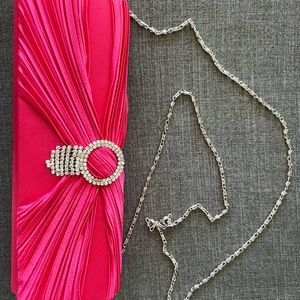 Elegant vintage hot pink clutch with diamanté detail and silver chain